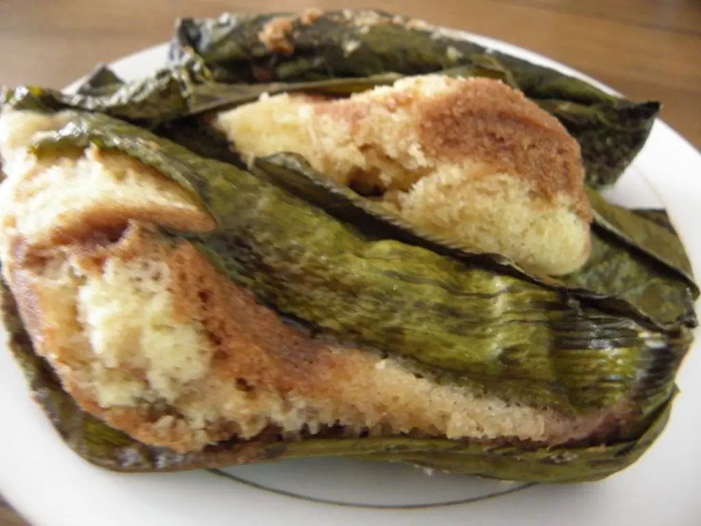 Quimbolitos steamed in banana leaves