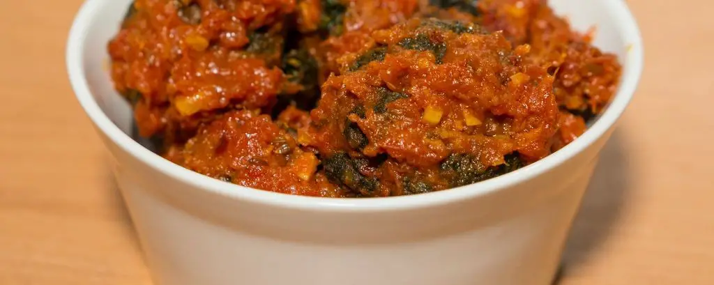 Rice and Spinach Koftas in Tomato Gravy
