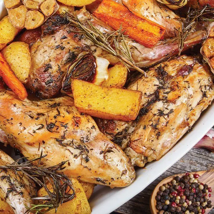 Roasted rabbit with herbs and potatoes