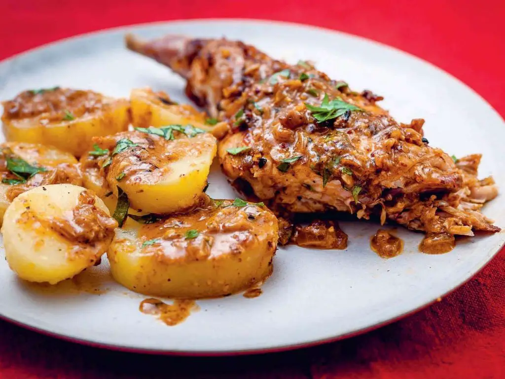 Slow-Cooked Guinea Pig in Adobo Sauce