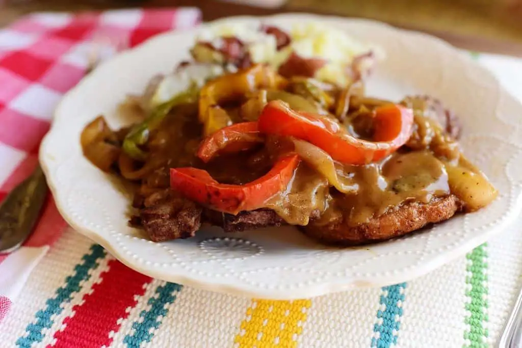 Smothered Pork Chops with Bell Peppers and Onions