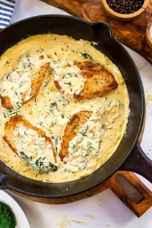 Smothered Pork Chops with Creamy Parmesan Sauce