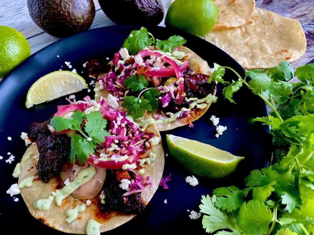 Spicy Duck Tacos with Avocado Salsa