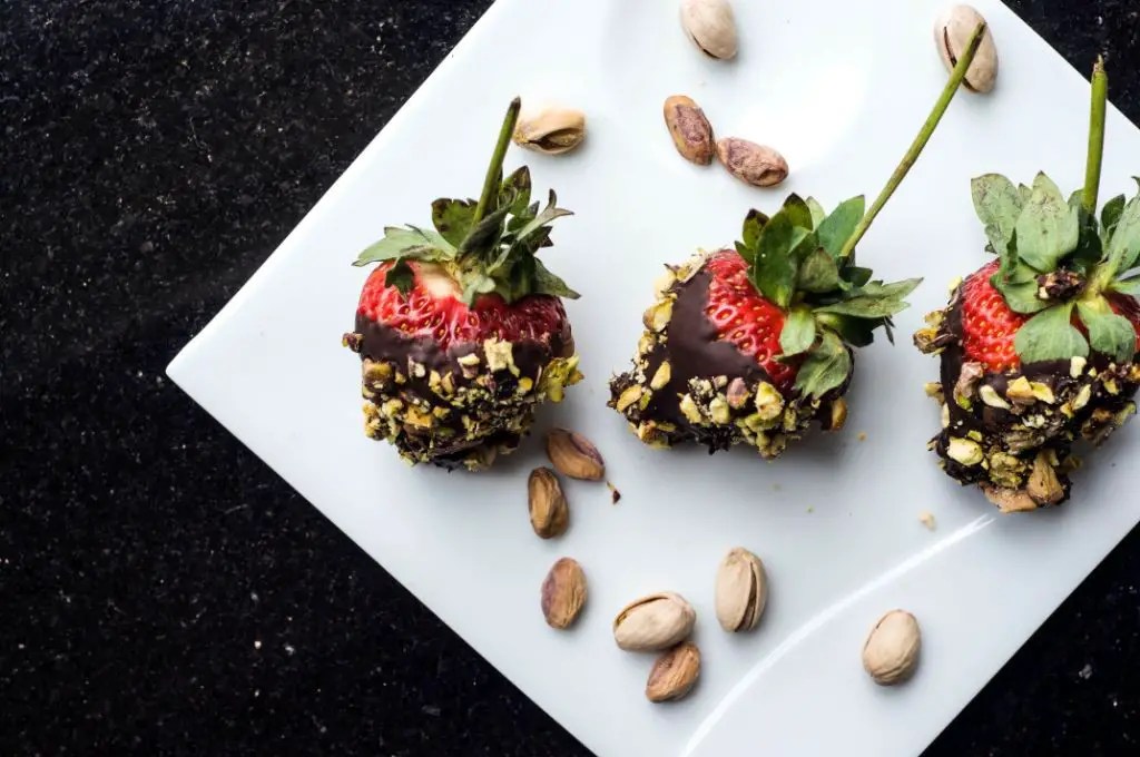 Strawberries Dipped in Chocolate and Pistachio Crumbles