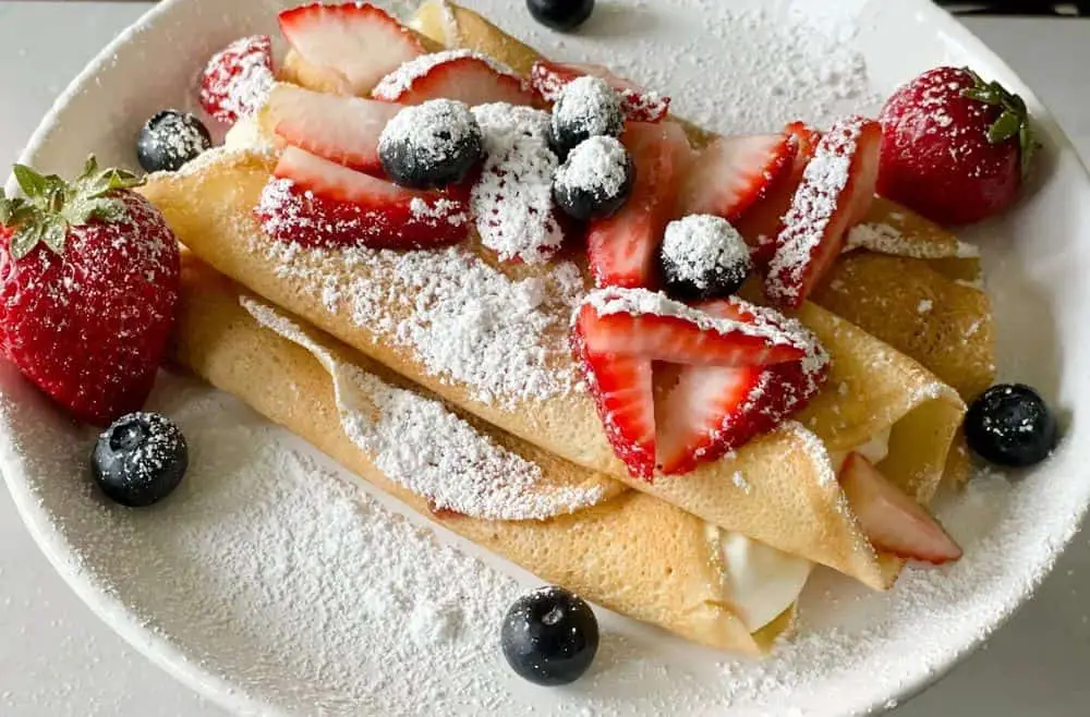 Strawberry Cheesecake Crepes with Fresh Strawberry Sauce