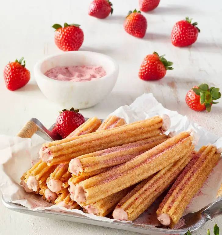 Strawberry-Filled Churros with Vanilla Icing