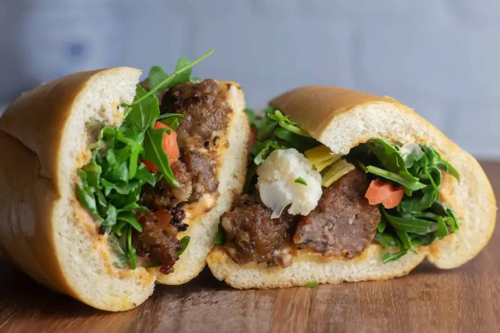 Zesty Italian Sausage and Arugula Sandwich