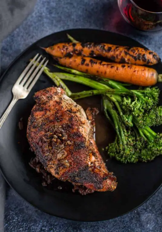 Braised Thick Bone-In Pork Chops in Red Wine Reduction