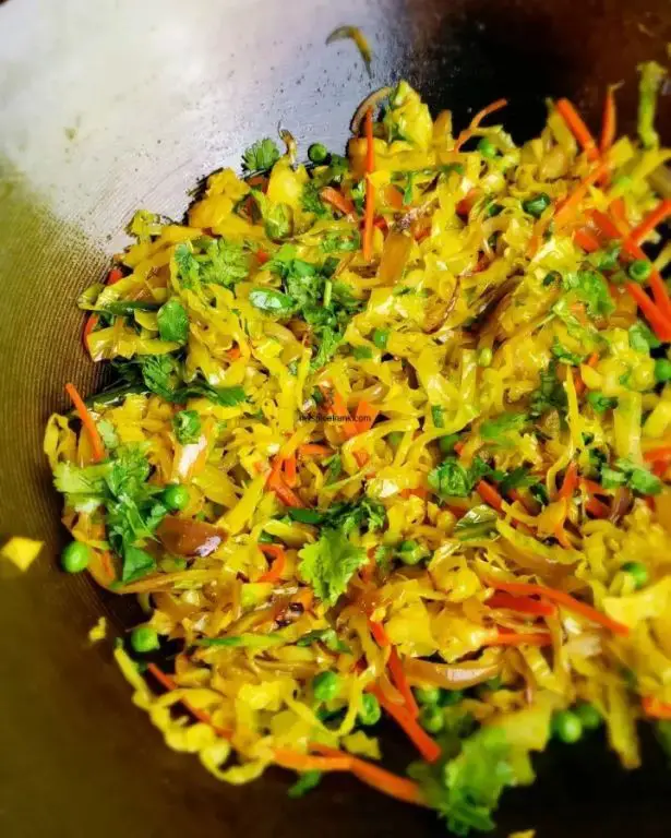 Fried Cabbage with Carrots and Peas