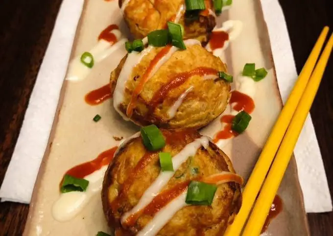 Garlic Butter Takoyaki with Parsley Garnish