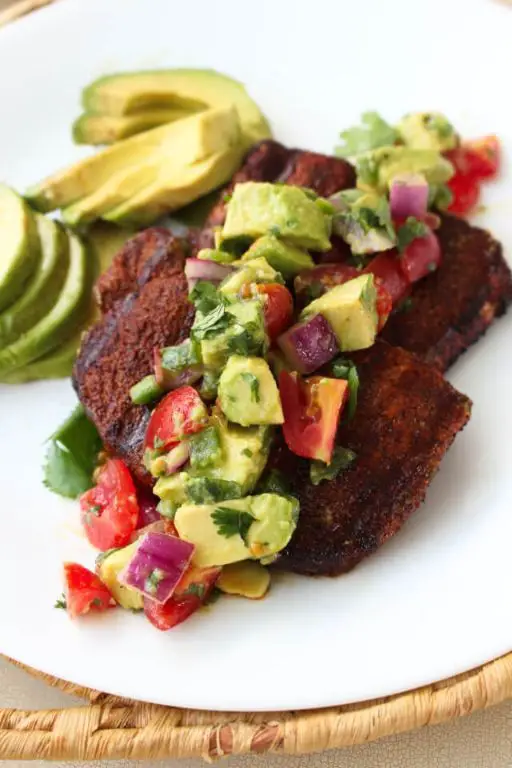 Spicy Cajun Pork Chops with Avocado Salsa