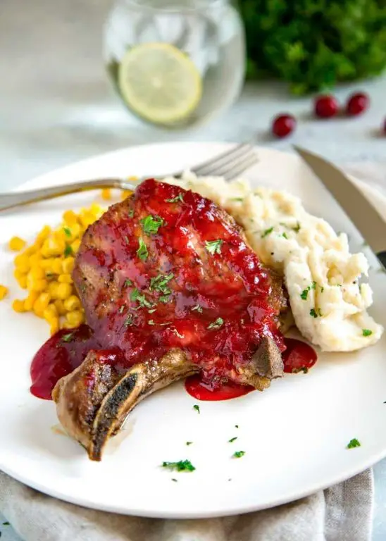 Thick Bone-In Pork Chops with Cranberry Orange Sauce
